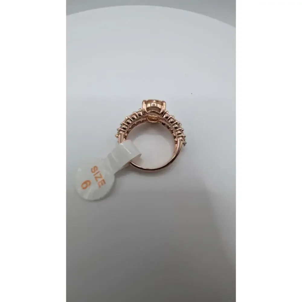 Rose Gold Tone Ring with Central Gem and Accent Stones Size 6